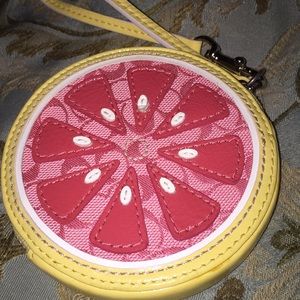 Coach citrus coin wristlet.